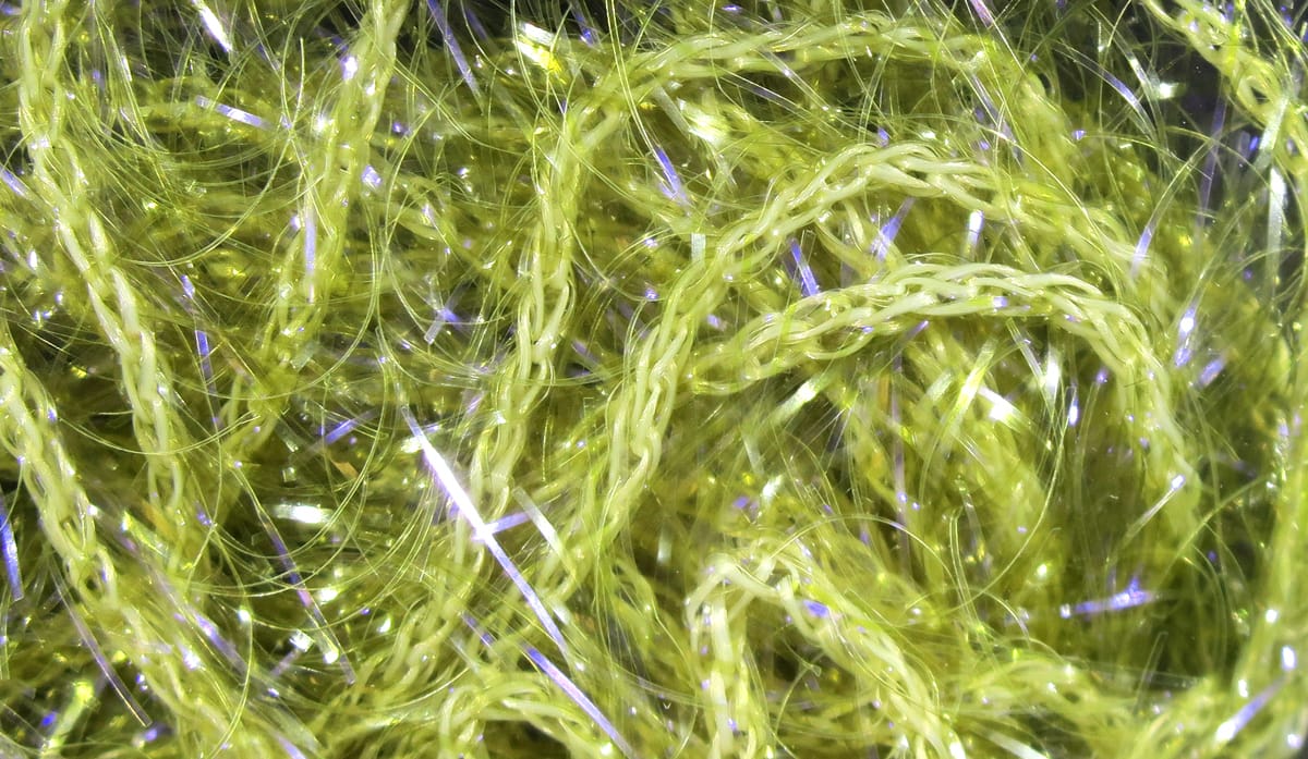 Chartreuse UV Polar chenille with braided core and iridescent flash fibers for fly tying