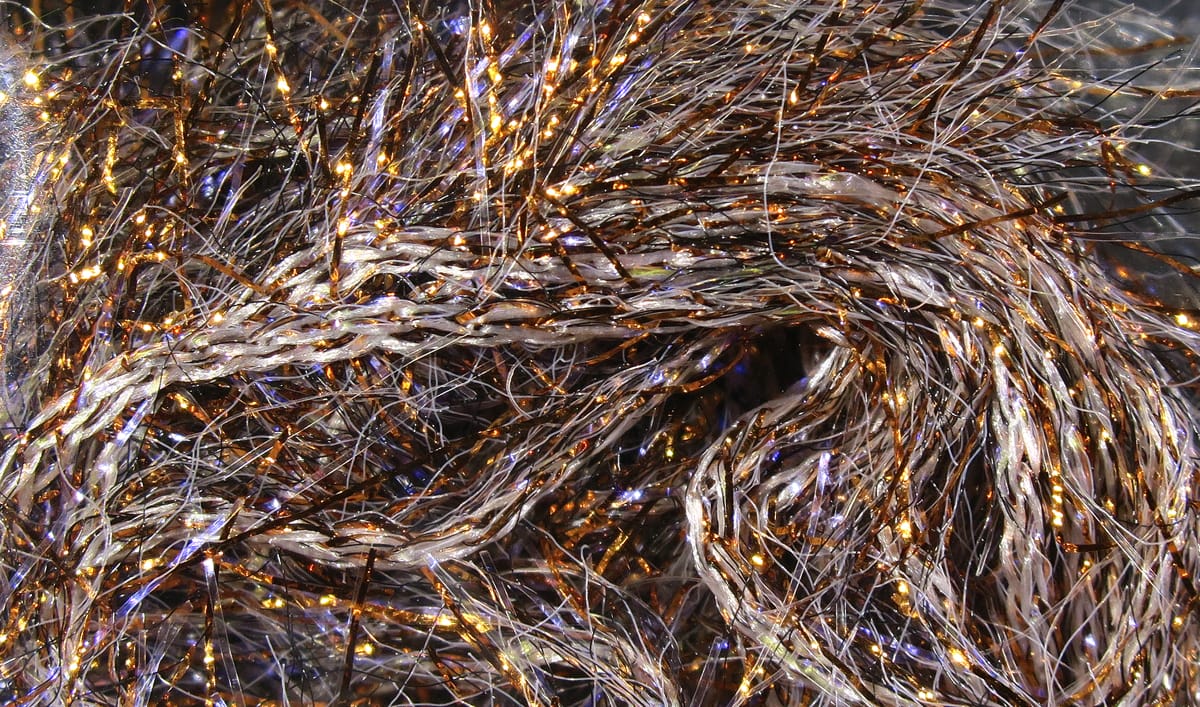 Hareline UV Polar chenille, twisted fuzzy fly tying yarn in copper, bronze and silver with iridescent metallic sparkle