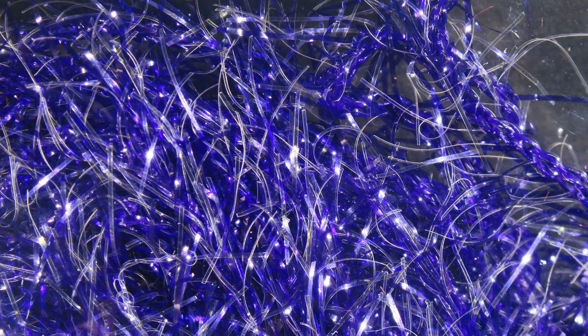 Hareline UV Polar chenille tangled royal blue and silver iridescent synthetic fibers for fly tying