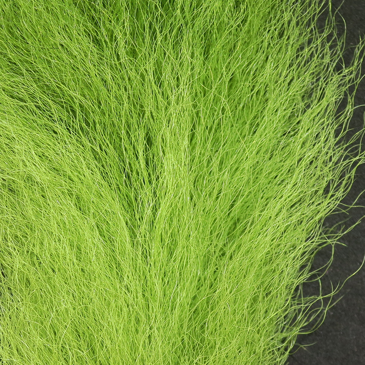 Chartreuse Hareline UV2 calf tail, long fine hair fibers for fly tying with dense, flowing texture