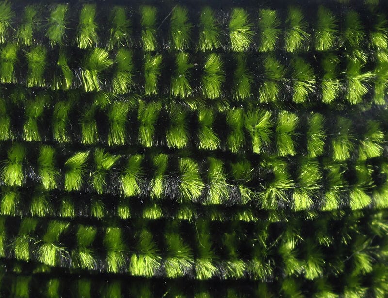 Hareline variegated chenille in bright lime green and black, fuzzy striped fly-tying material