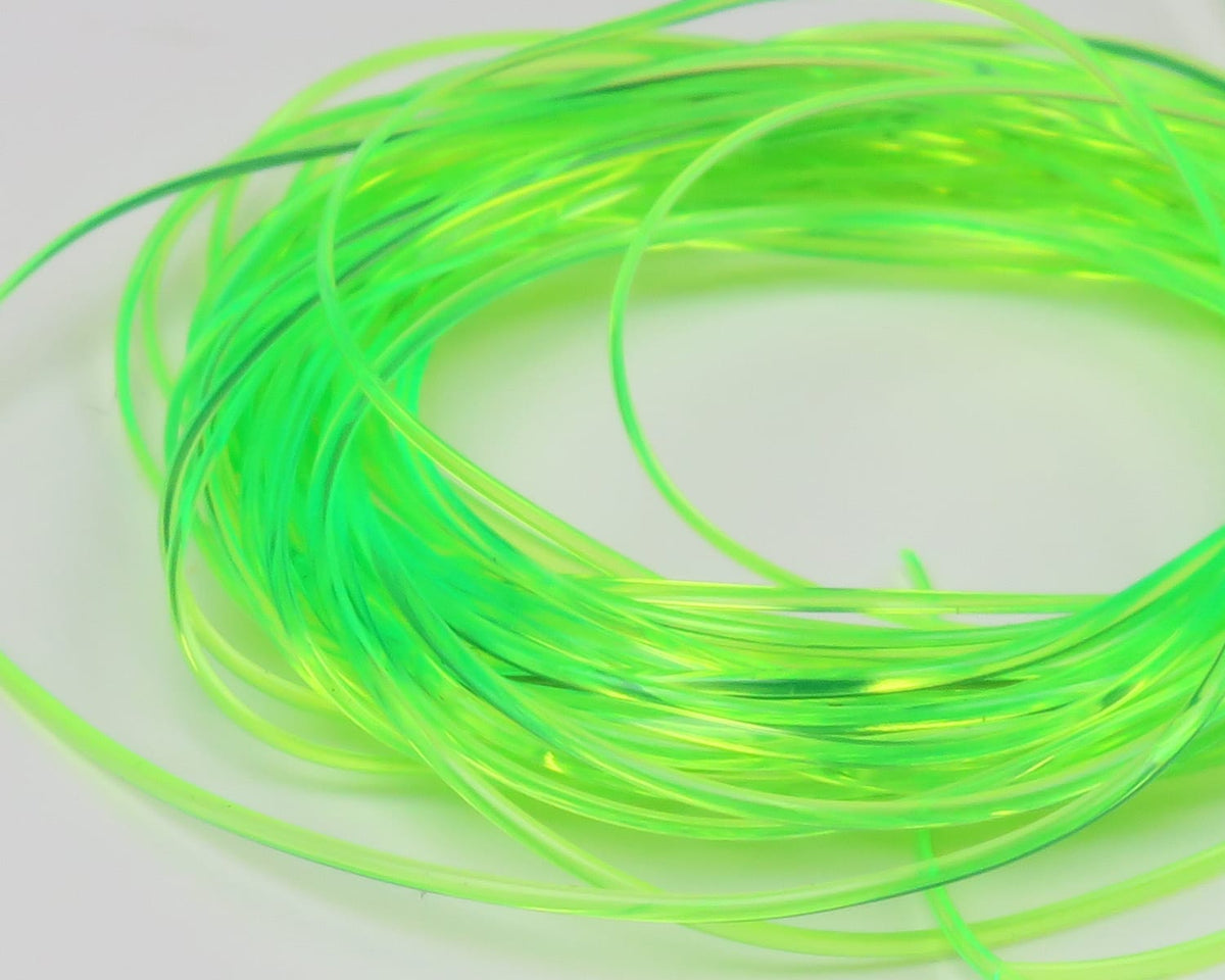 Coiled neon chartreuse translucent vinyl rib for fly tying, thin flexible strands with glossy finish