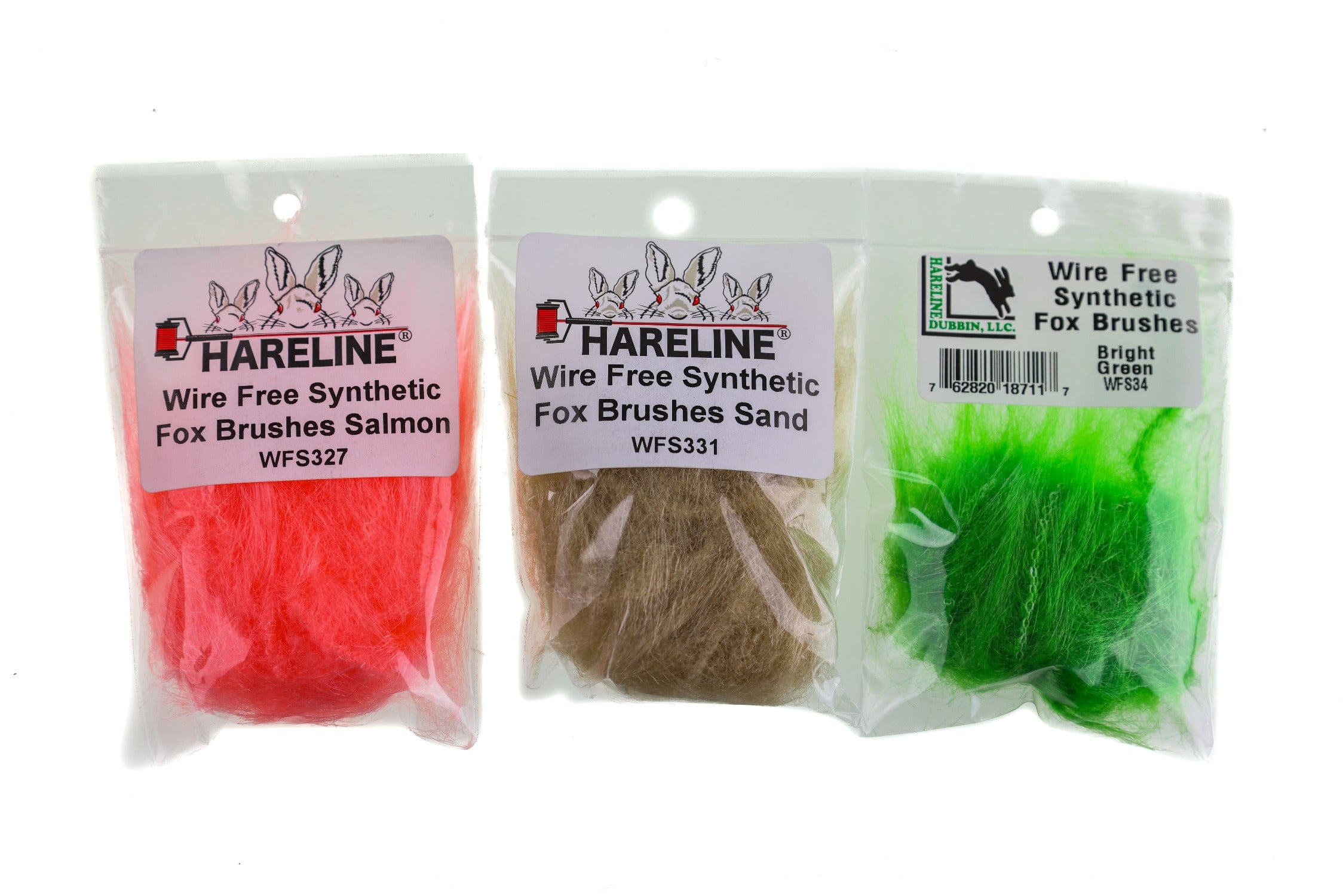 Three Hareline wire-free synthetic fox brushes for fly tying - salmon red, sand tan and bright green fibers in clear packages