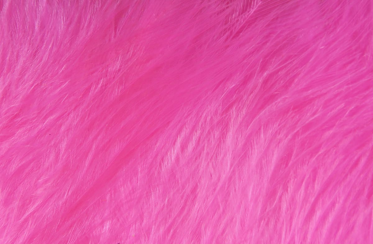 Hot pink marabou feathers with soft fluffy fibers for Woolly Bugger fly tying