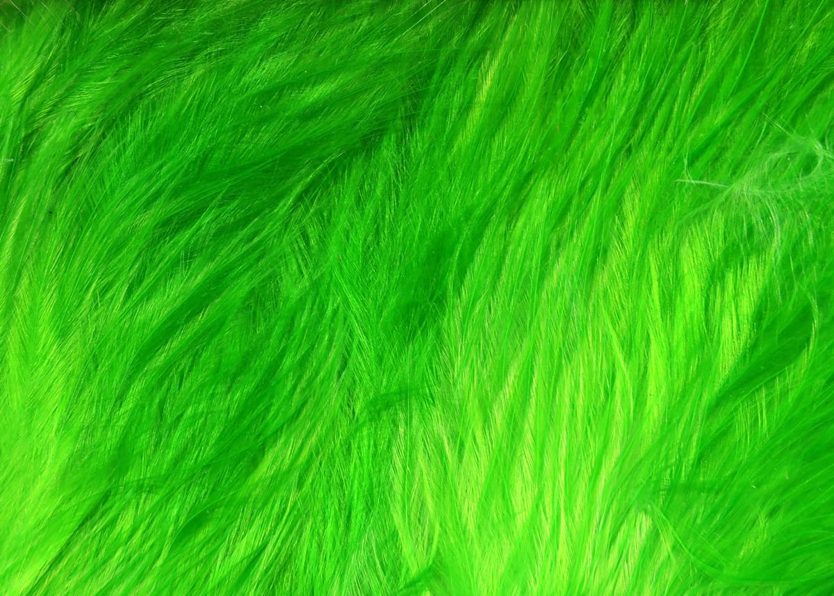 Fluorescent green Hareline Woolly Bugger marabou feathers, soft flowing fibers for fly tying