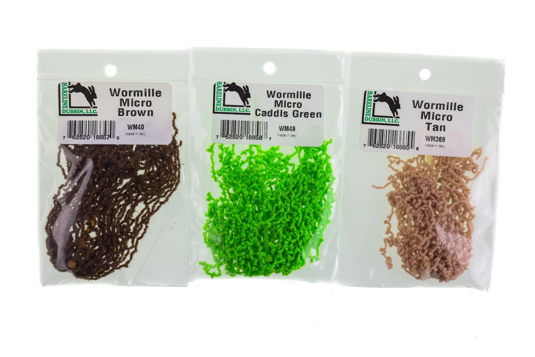 Hareline Wormille micro dubbing for fly tying: brown, caddis green, and tan curly synthetic fibers in clear bags