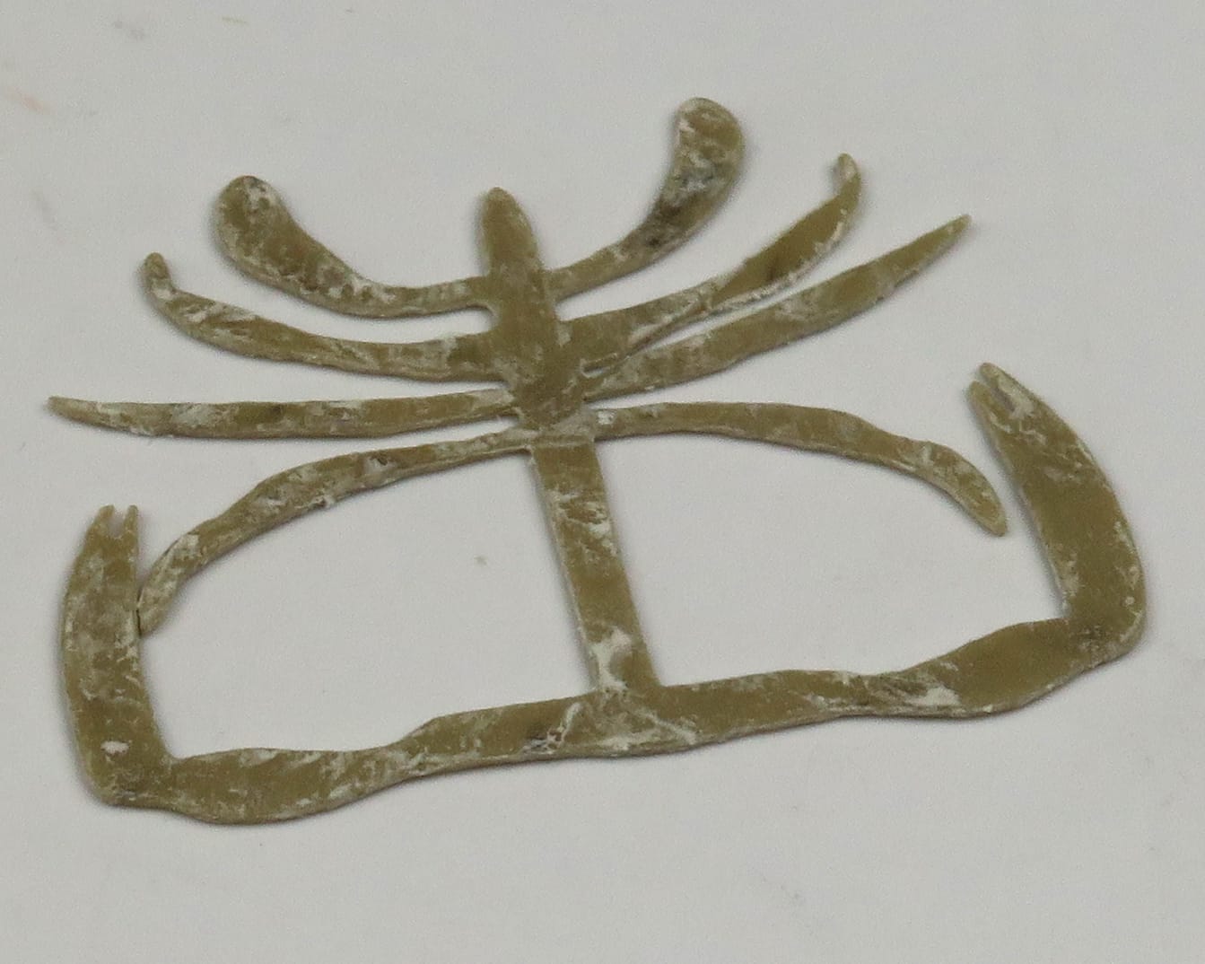 Hareline Kiley's Crab Bits olive-mottled soft rubber crab legs, flat segmented bait pieces for fly tying