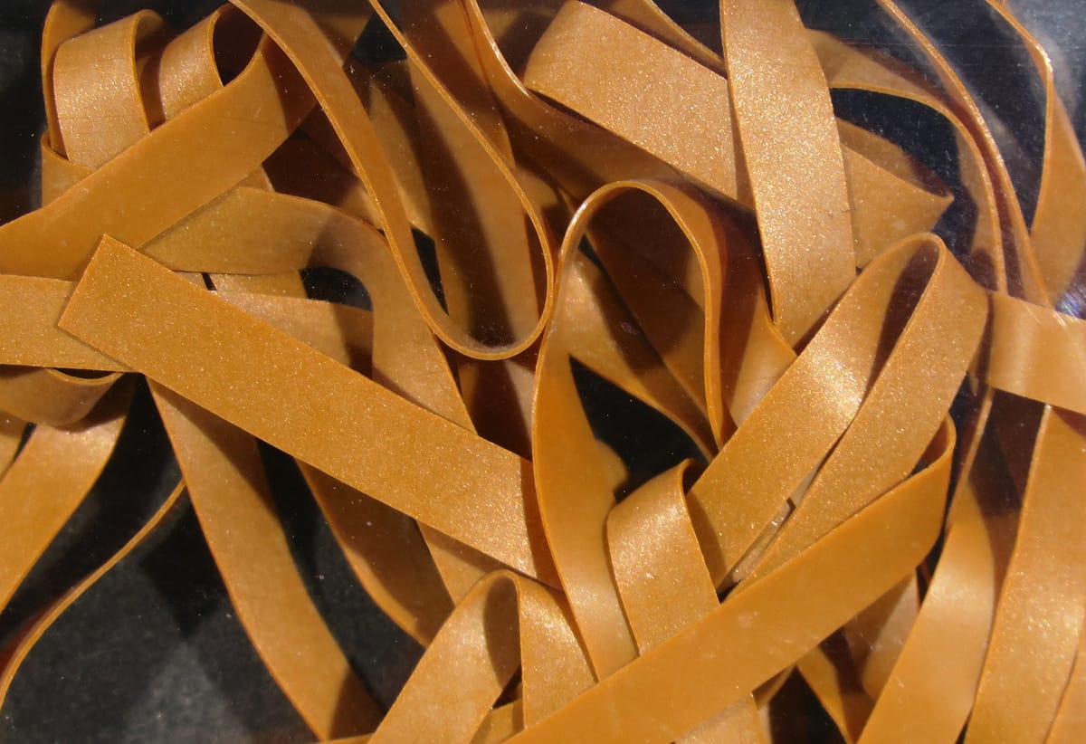 Kiley's Nymph Skins amber tan pearlescent synthetic strips for fly tying, flat shimmery material