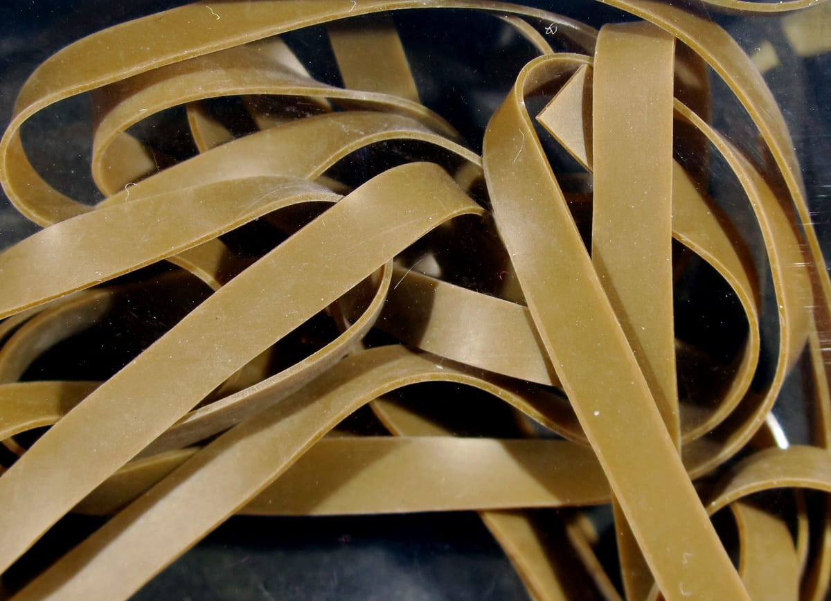 Tan olive flat synthetic nymph skins strips, smooth matte rubbery material for fly tying
