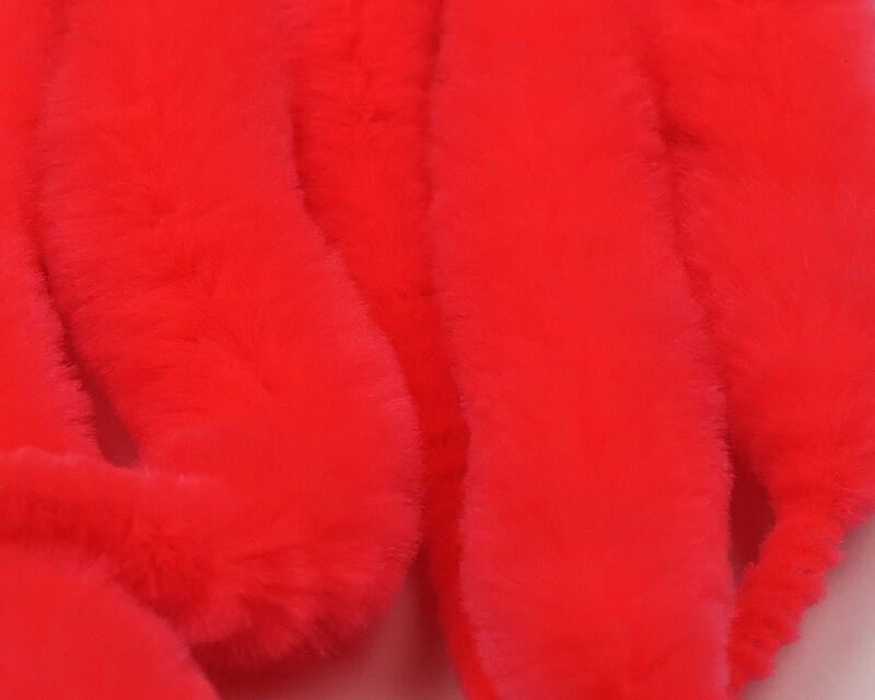 Bright red Hareline Mangum's Micro Dragon Tails synthetic fur strips for fly tying, fluffy dense texture