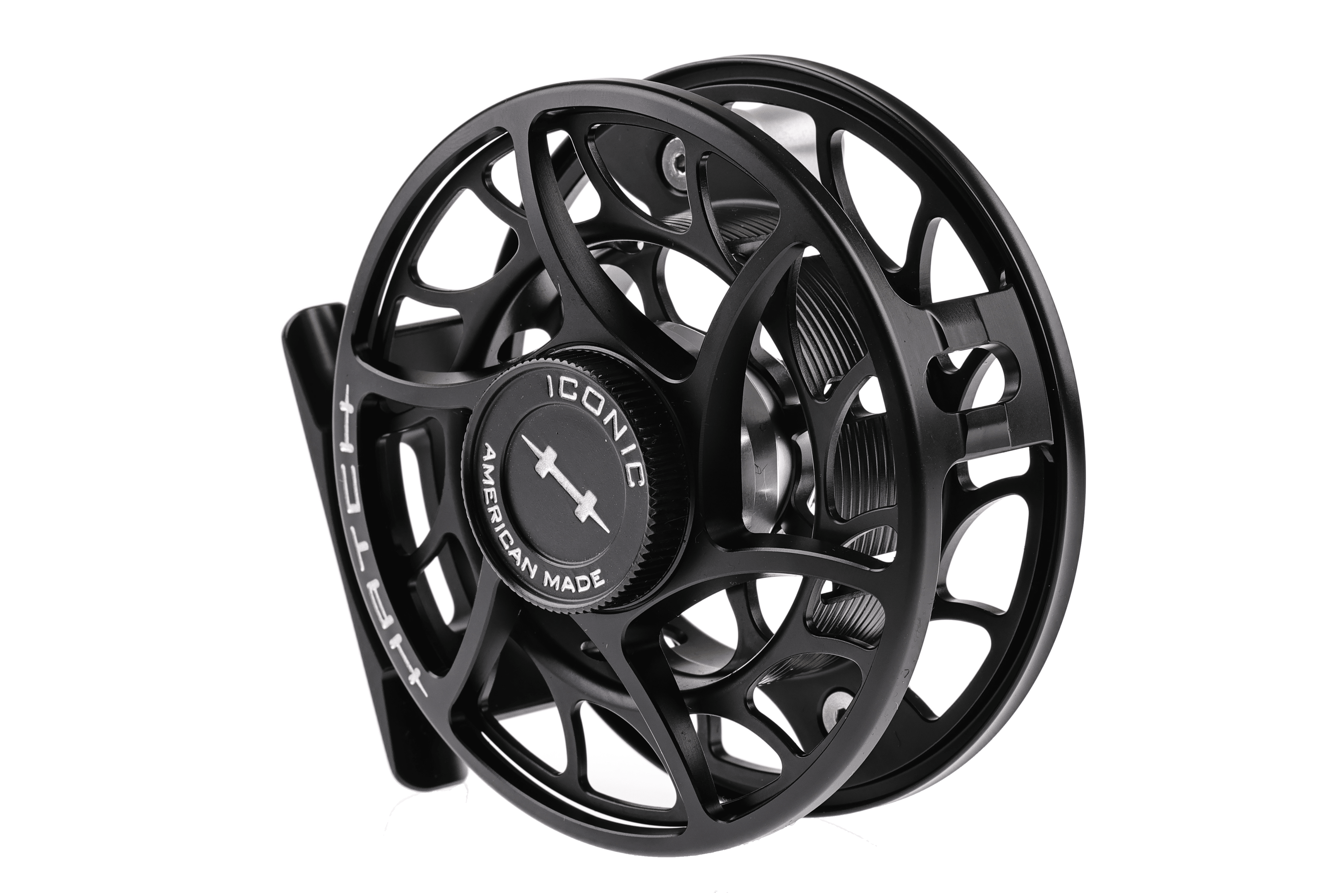 Black machined aluminum Hatch Iconic large-arbor fly reel with skeletonized spool, textured drag knob and American-made badge