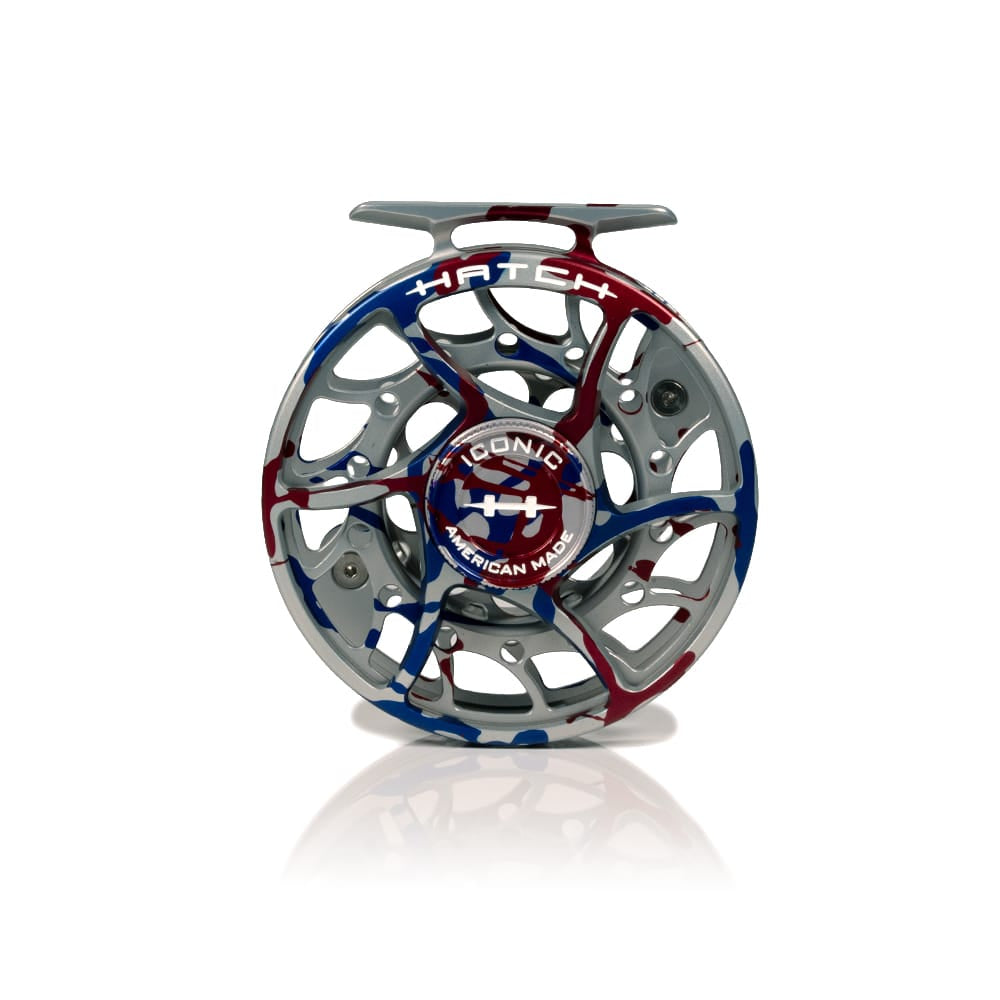 Hatch Iconic fly reel, machined silver aluminum with red white and blue USA anniversary camo paint and skeletonized spool