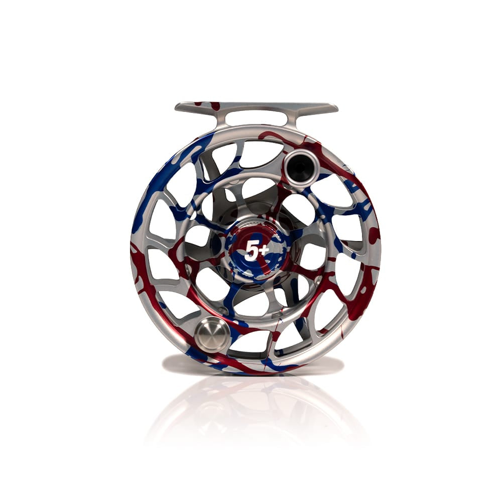 Hatch fly reel in machined silver aluminum with red white and blue USA camo finish, ported spool with 5+ center marking