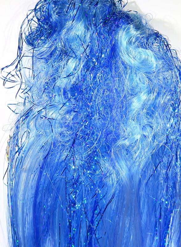 Bright electric blue Hedron Big Fly synthetic fly tying fibers with curled texture and sparkling iridescent tinsel strands