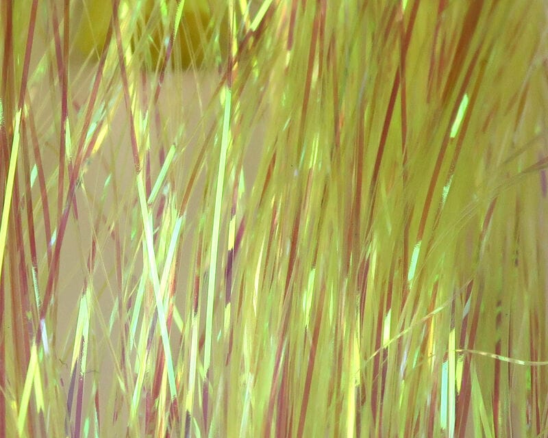 Hedron Dyed Pearl Flashabou: iridescent yellow-green and pink synthetic tinsel strands for fly tying
