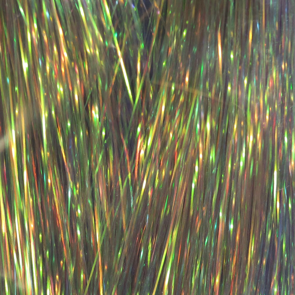 Hedron Dyed Pearl Flashabou iridescent green-gold metallic tinsel strands with shimmering pearl finish for fly tying