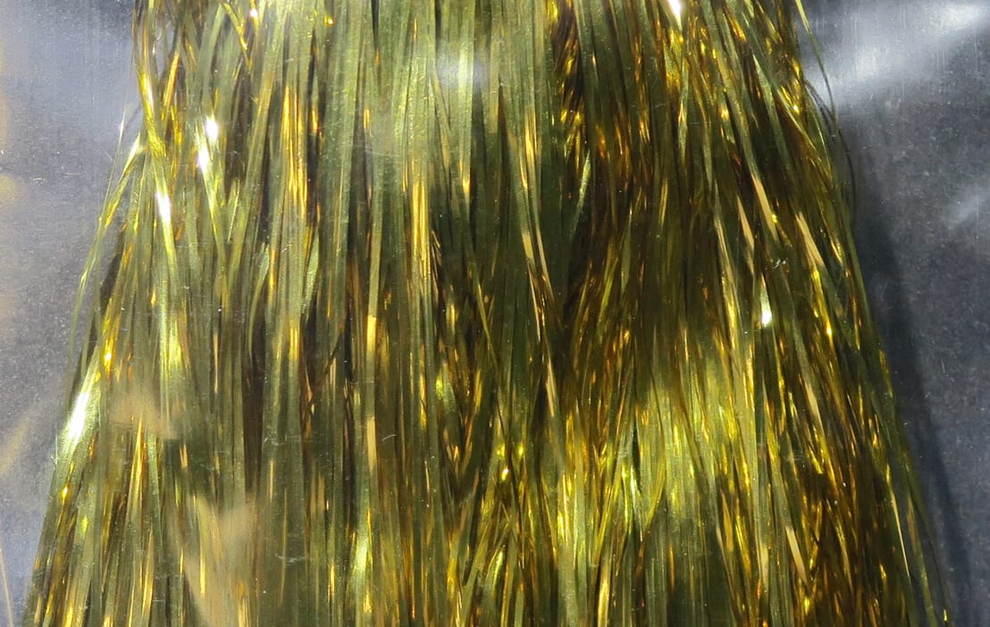 Hedron Flashabou olive-gold metallic tinsel strands for fly tying, shimmering reflective synthetic fibers