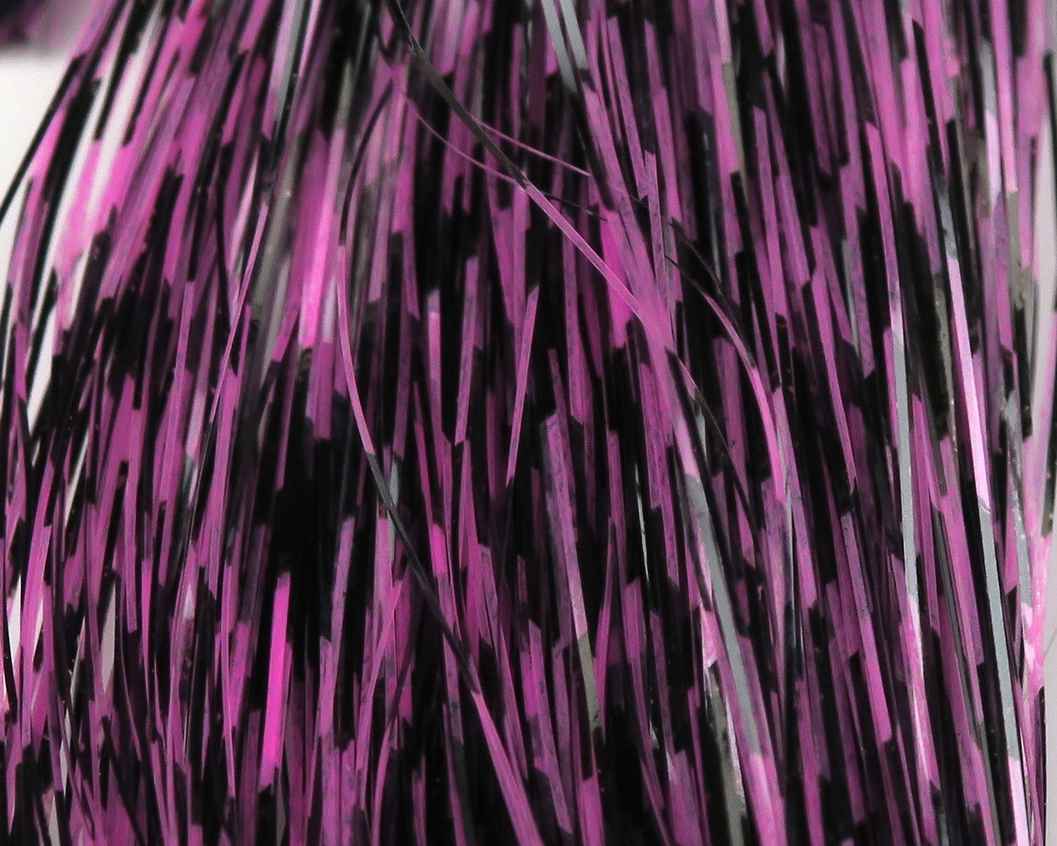 Hedron Grizzly-Barred Flashabou magenta and black barred metallic tinsel strands for fly tying