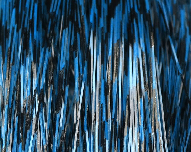 Blue and black grizzly-barred metallic Flashabou tinsel strands, reflective thin strips for fly tying and lure decoration
