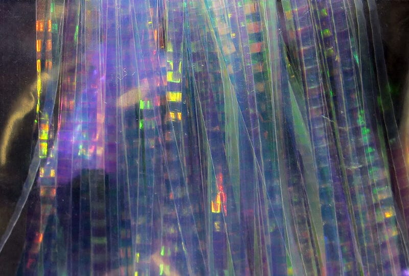 Hedron Lateral Scale fly tying material, iridescent blue-purple holographic strips with green-gold reflective squares