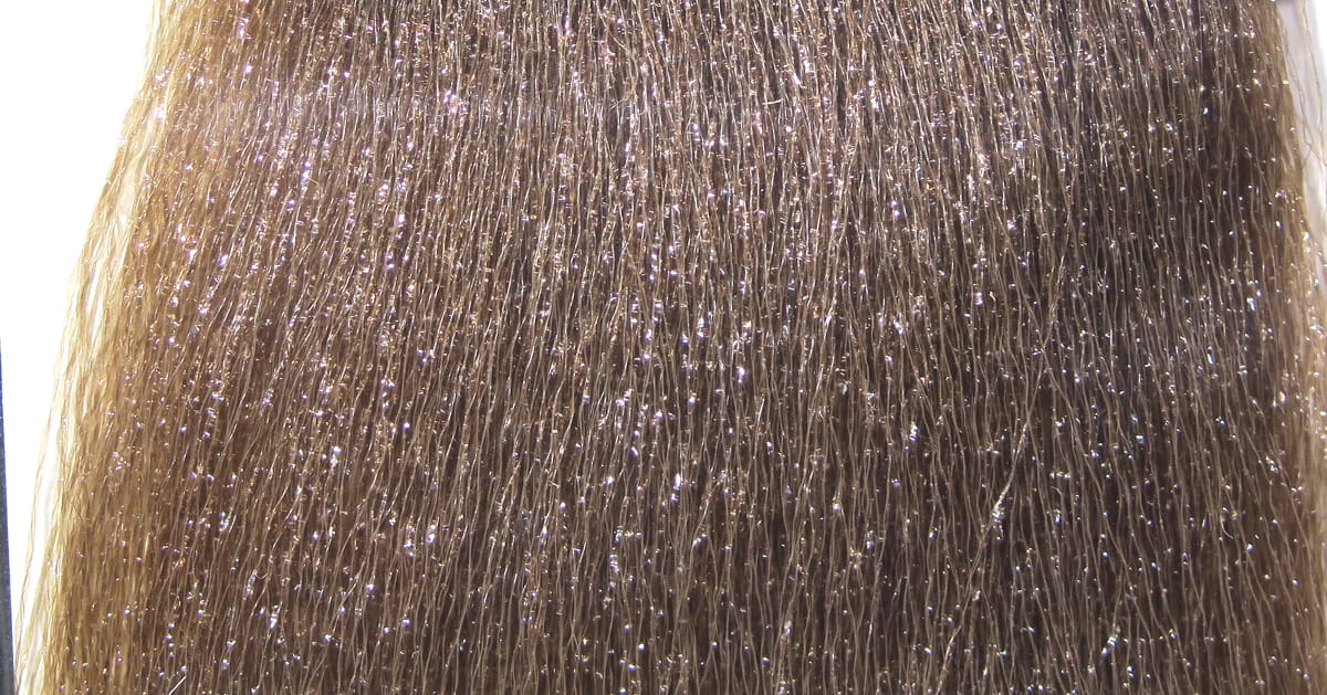 Hedron Microlon brown synthetic microfibers with fine silver flash, dense hair-like strands for fly tying