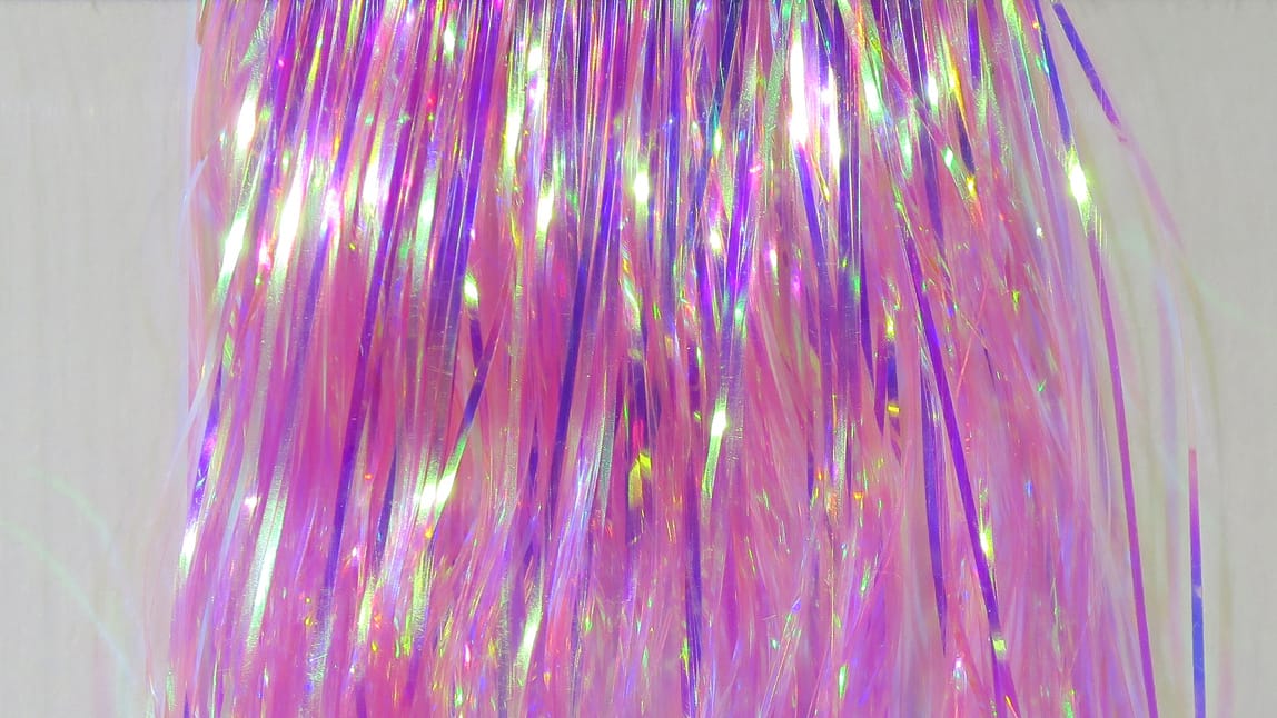 Iridescent pink Hedron Mirage Flashabou strands, holographic synthetic flash material for fly tying