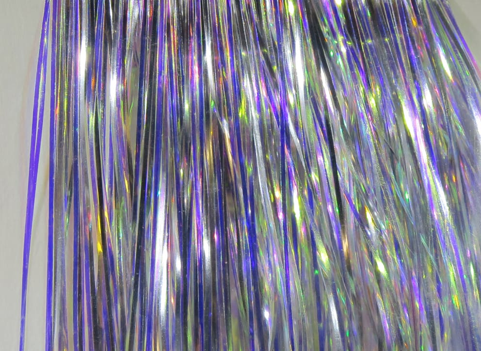 Hedron Mirage Flashabou holographic tinsel strands, silver with purple and green iridescent flash for fly tying