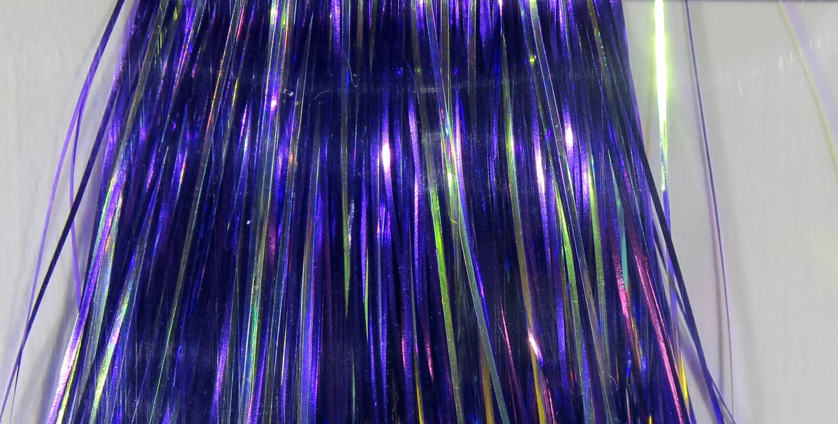 Purple iridescent Hedron Mirage Flashabou strands, holographic thin synthetic tinsel for fly tying
