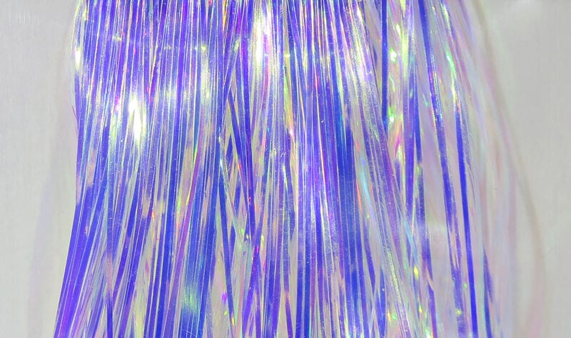 Mirage Flashabou iridescent purple and silver holographic tinsel strands for fly tying, thin shimmering fibers