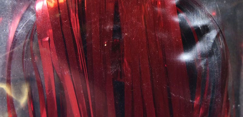 Hedron Saltwater Flashabou red metallic tinsel strands, glossy reflective synthetic strips for fly tying