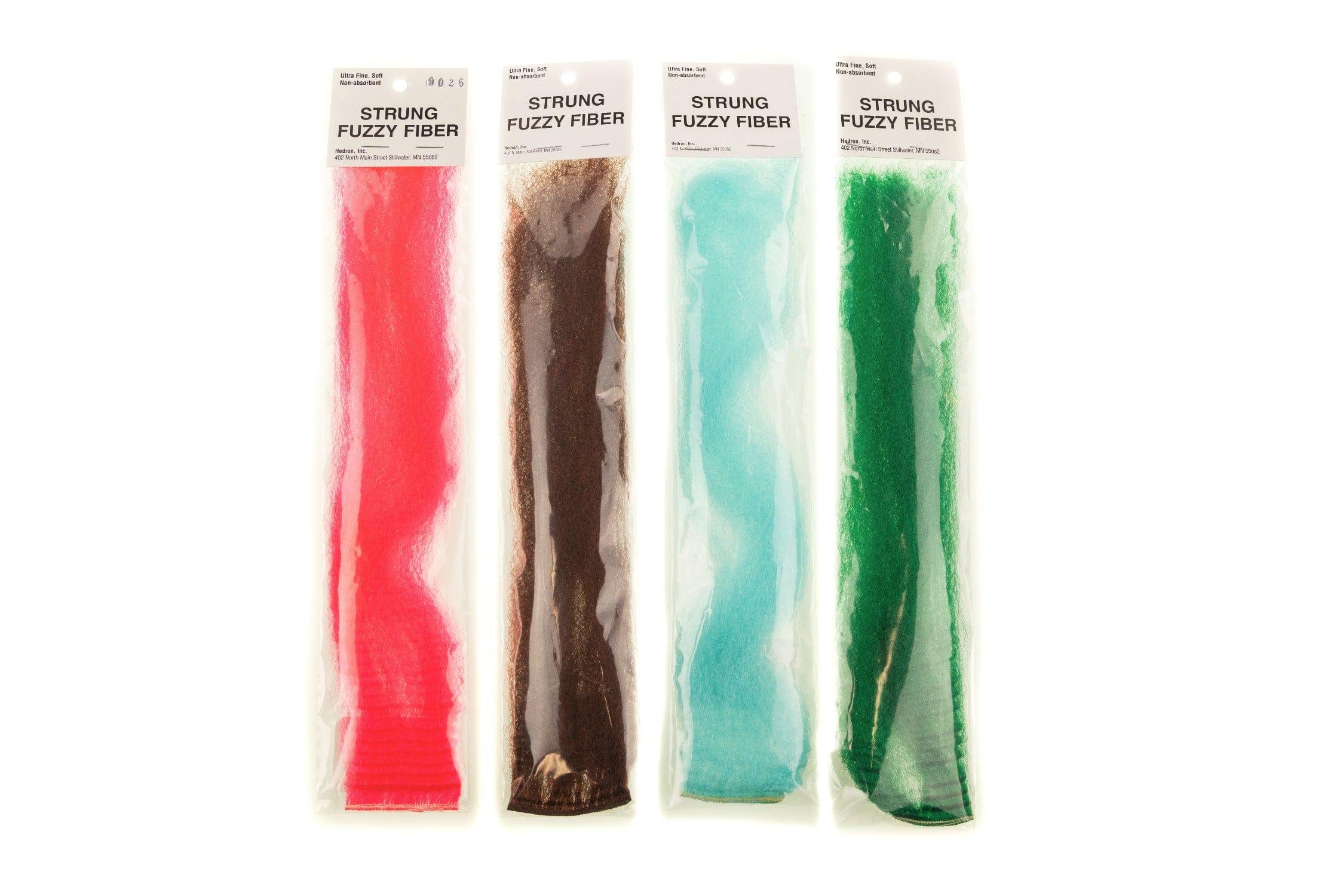 Four Hedron Strung Fuzzy Fiber packs in bright red, dark brown, aqua and emerald green, soft fuzzy fly tying fiber