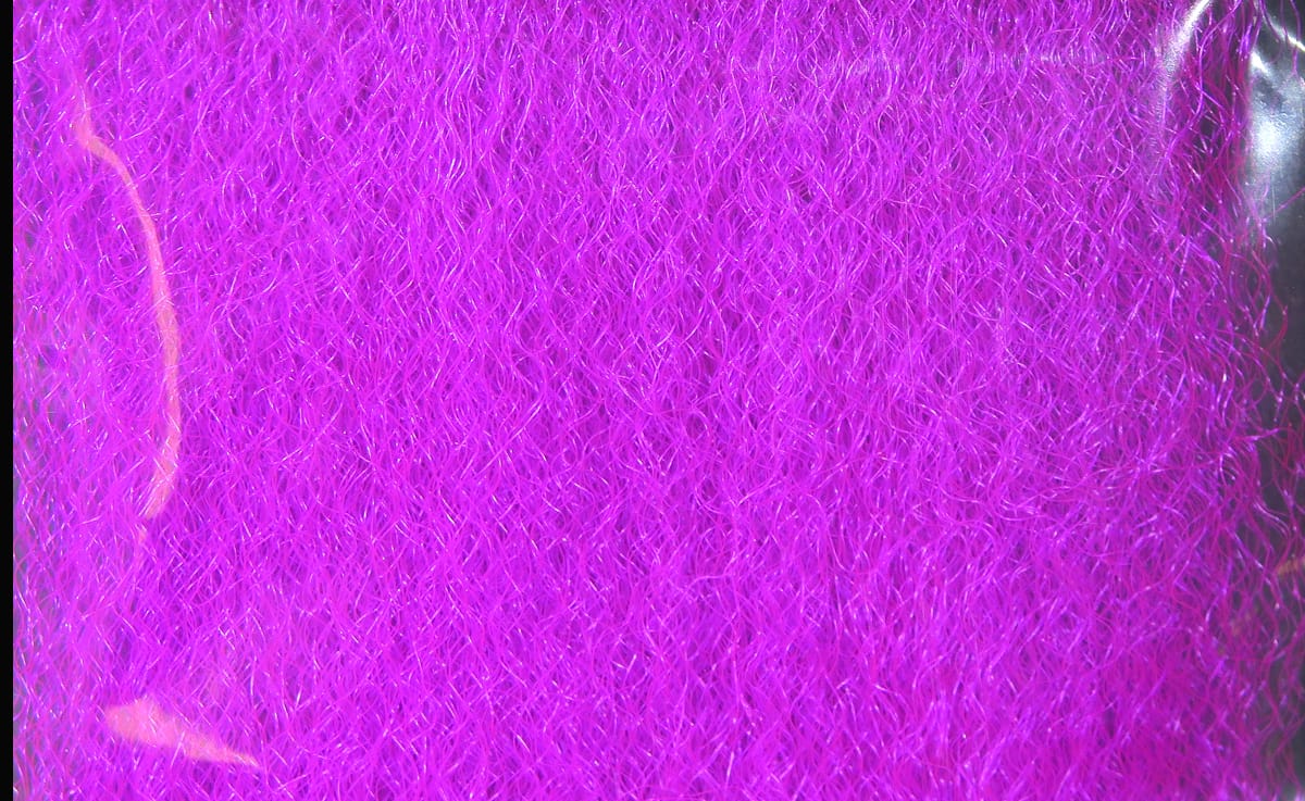 Bright magenta strung fuzzy fiber for fly tying, densely packed synthetic wispy strands with subtle iridescent sheen