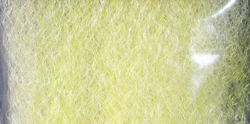 Hedron strung fuzzy fiber in chartreuse yellow with iridescent synthetic strands for fly tying