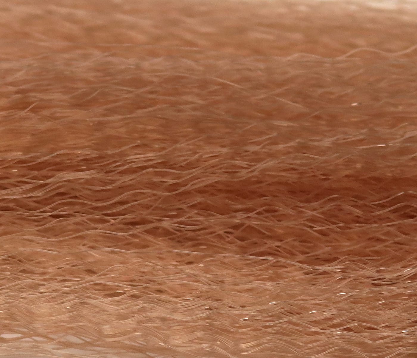Hedron Supreme Super Hair tan copper synthetic fibers, fine wavy strands with subtle sheen for fly tying