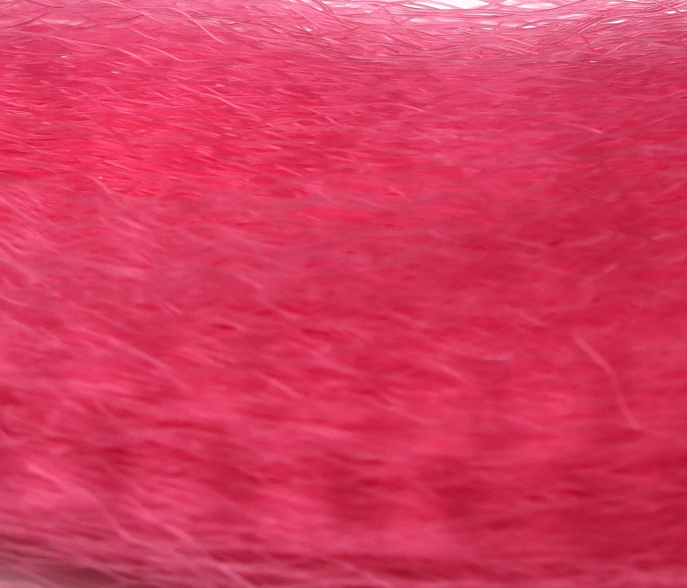 Bright rose-pink synthetic hair with fine glossy fibers, Hedron Supreme Super Hair fly tying material