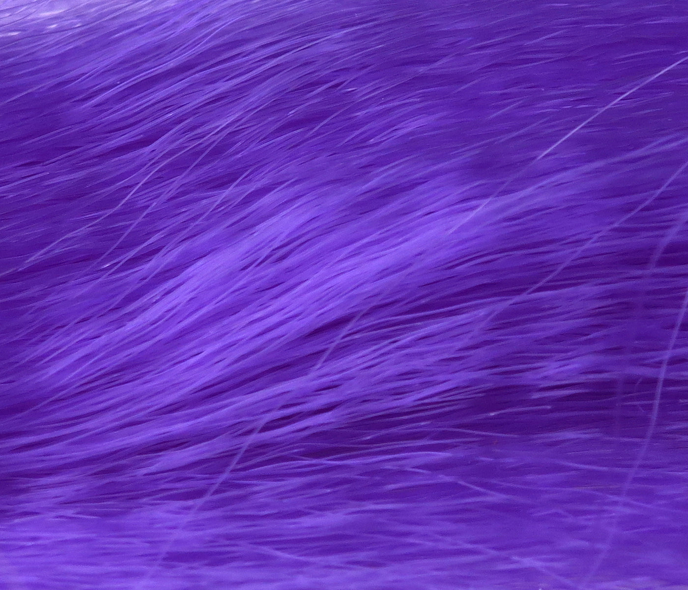 Vibrant purple synthetic fly tying hair with fine silky fibers for streamers and lures