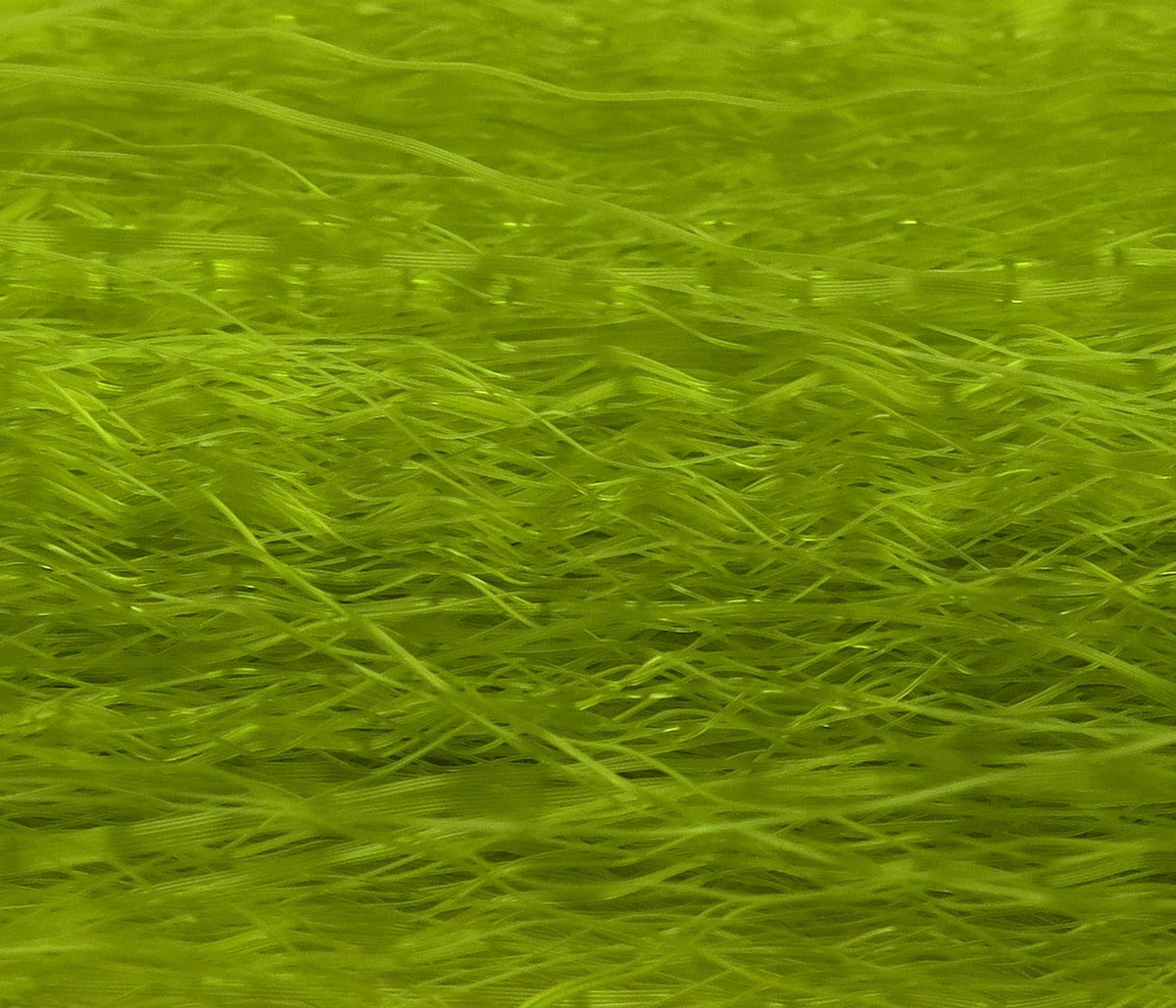 Chartreuse Hedron Unique Hair: fine translucent synthetic fly-tying fibers with wispy, layered strands