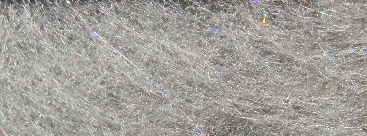 Light silver synthetic Hareline Jr. Bruiser dubbing with fine iridescent flash fibers for fly tying