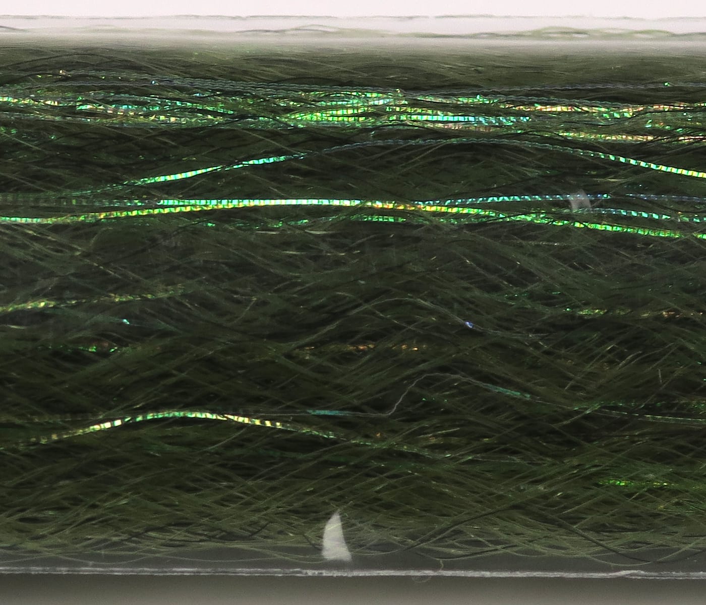 Olive green synthetic fly-tying fibers with iridescent green metallic flash slinky strands