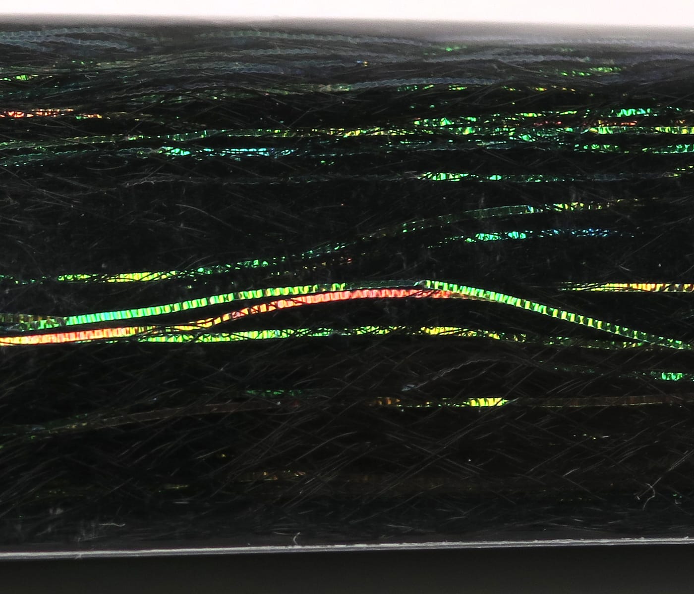 Black synthetic fly tying fibers with green and red iridescent Flash N Slinky holographic strands