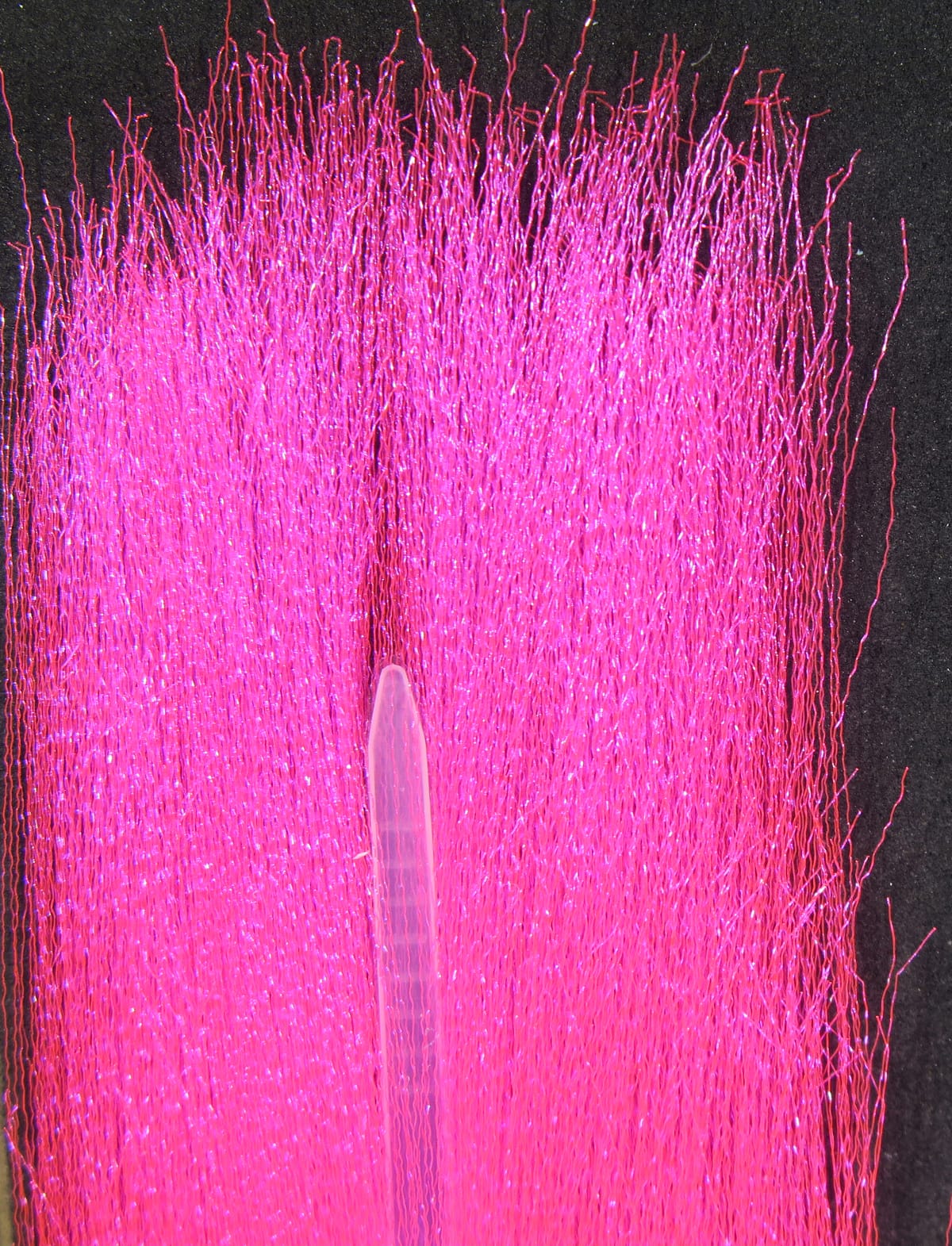 Fluoro fibre bundle in bright fluorescent pink with glittery synthetic strands for fly tying