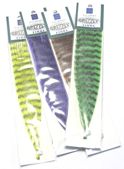 Pack of four Just Add H2O Grizzly Fibre fly tying feathers in zebra-striped yellow, purple, brown and green