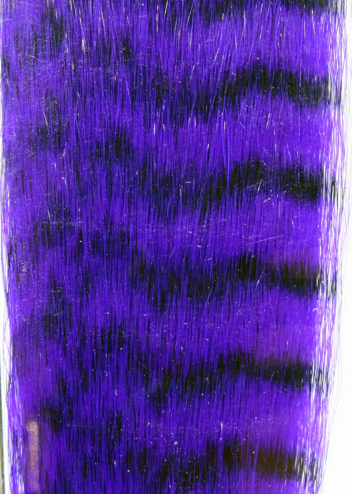 Purple and black barred synthetic grizzly fibre with glossy long strands and subtle metallic flash for fly tying