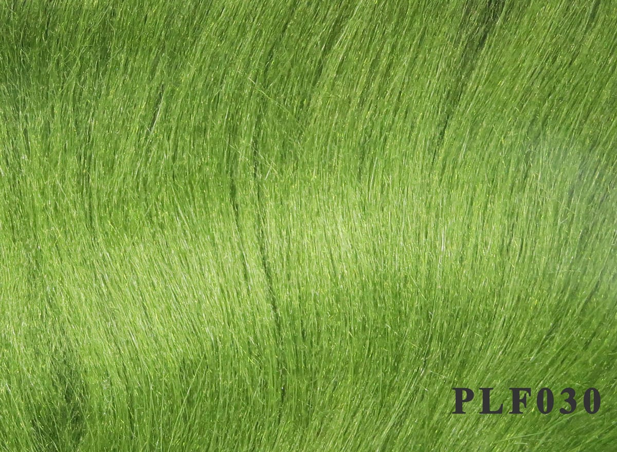 Chartreuse green polar fibre strands with silky synthetic texture for fly tying, dense long fibers
