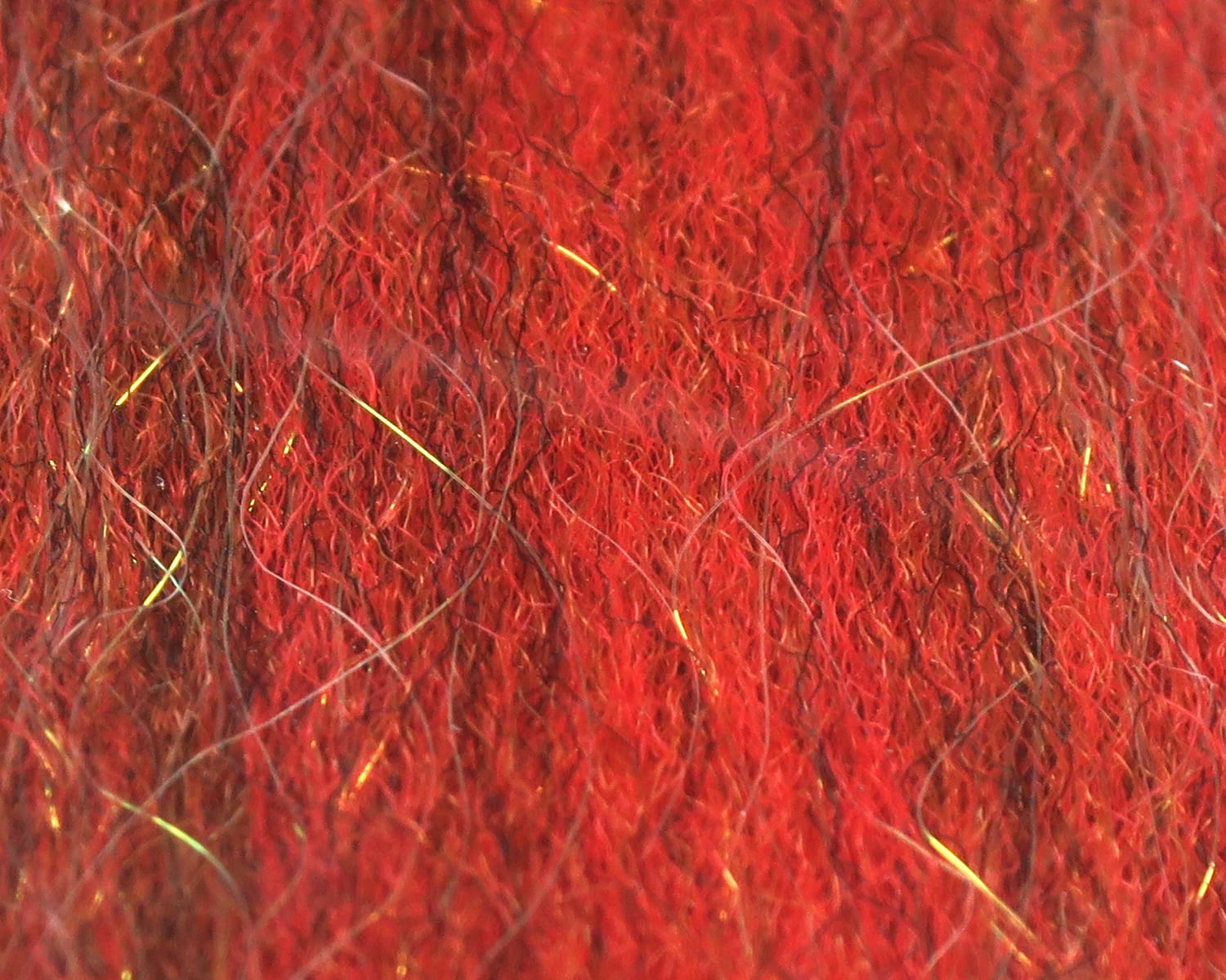 Red sculpting flash fibre with curly synthetic strands and gold reflective flash for fly tying