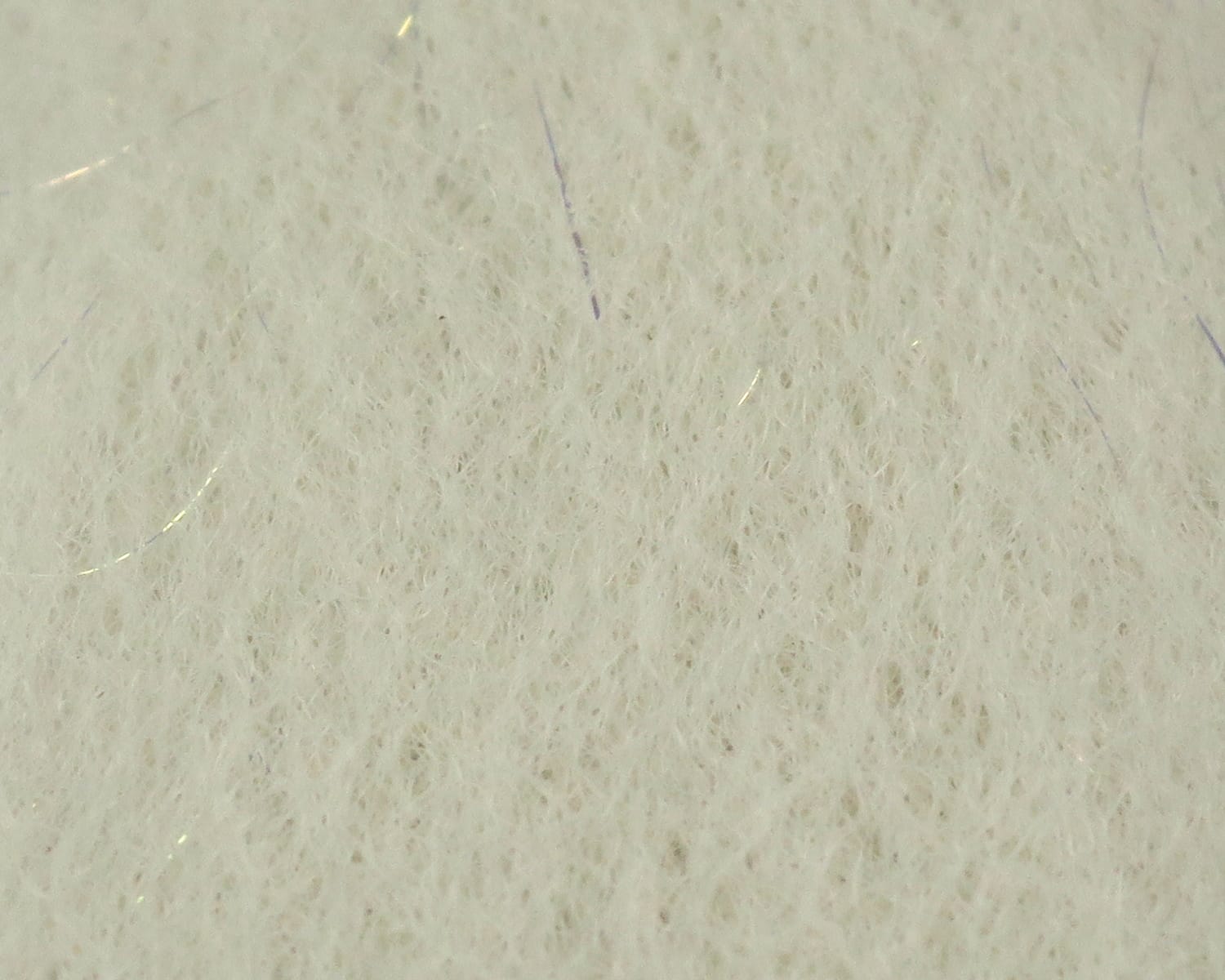White sculpting flash fibre sheet with soft wool-like fibers and subtle iridescent strands for fly tying