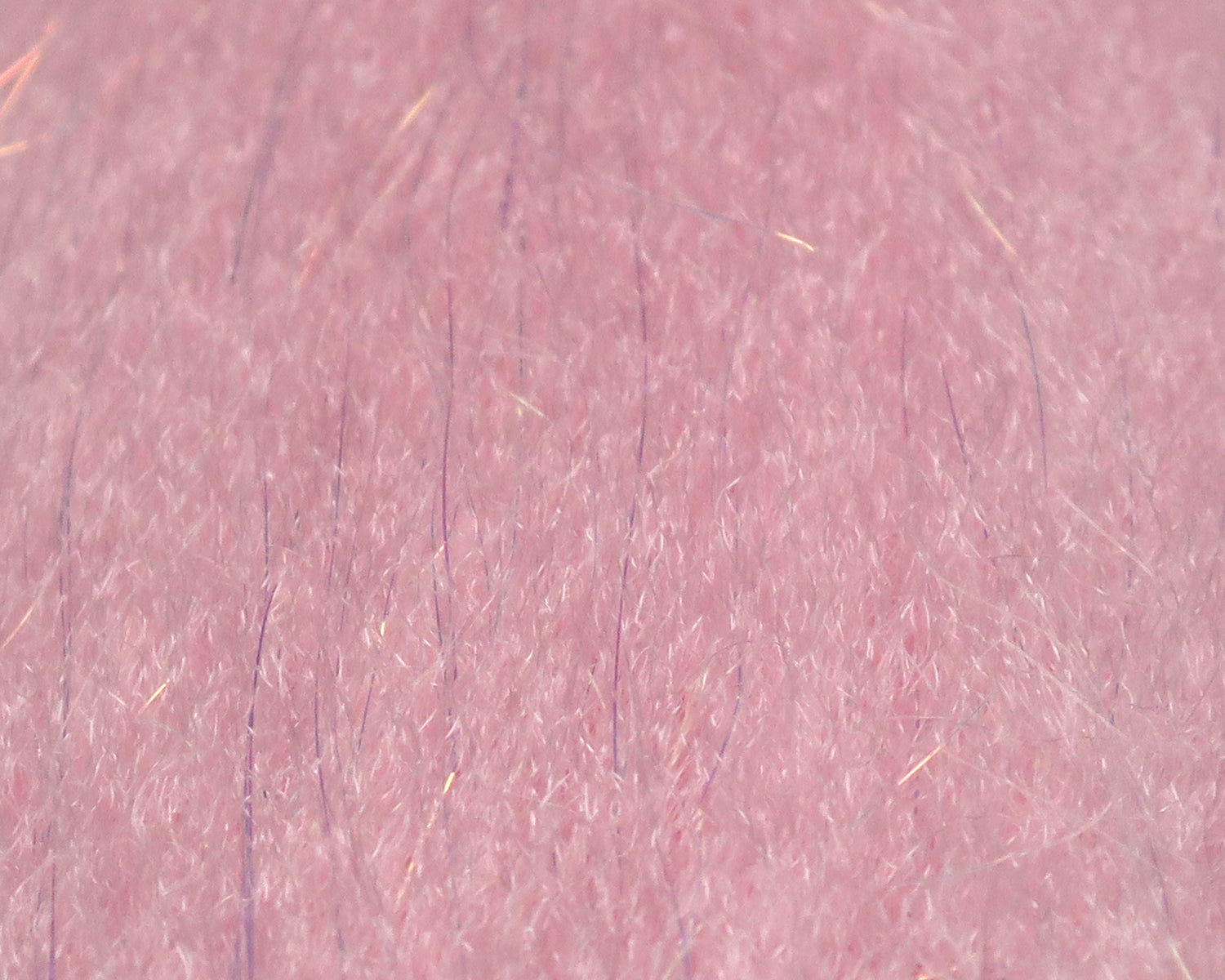 Pale pink sculpting flash fibre with fine iridescent purple and gold strands for fly tying