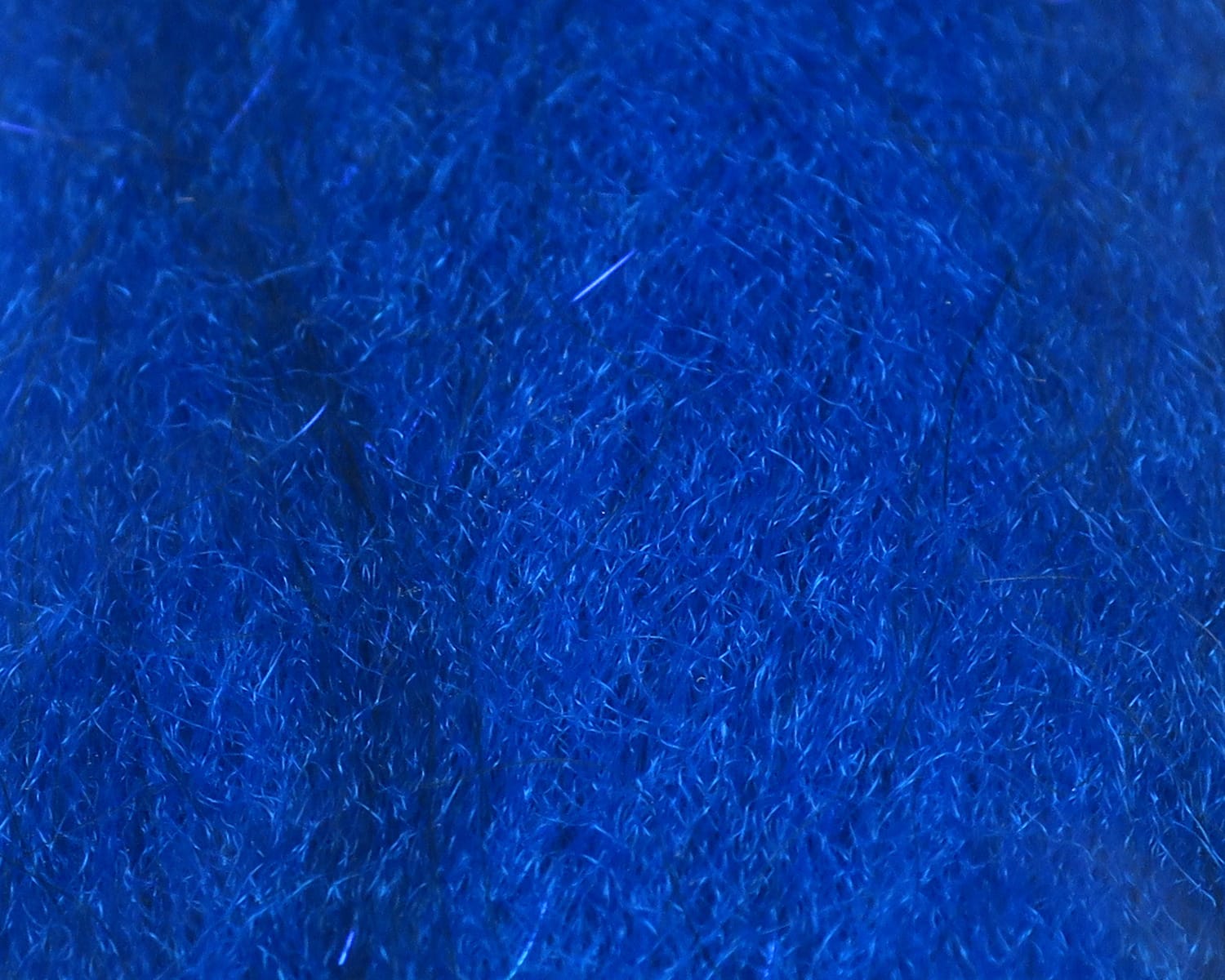 Electric blue sculpting flash fibre bundle with fine shimmery synthetic strands for fly tying