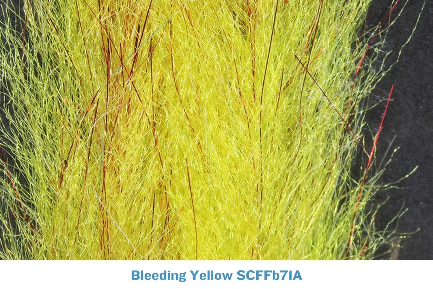Bleeding yellow synthetic flash fibers with thin red sparkle strands, wispy sculpting streamer brush for fly tying
