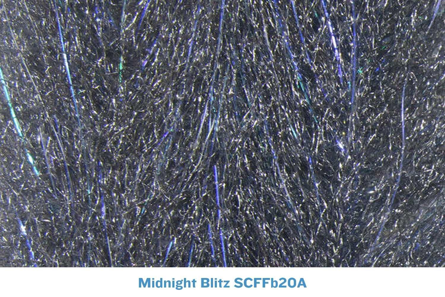 Midnight blue-black synthetic fibers with iridescent blue and silver flash strands, sculpting streamer brush for fly tying
